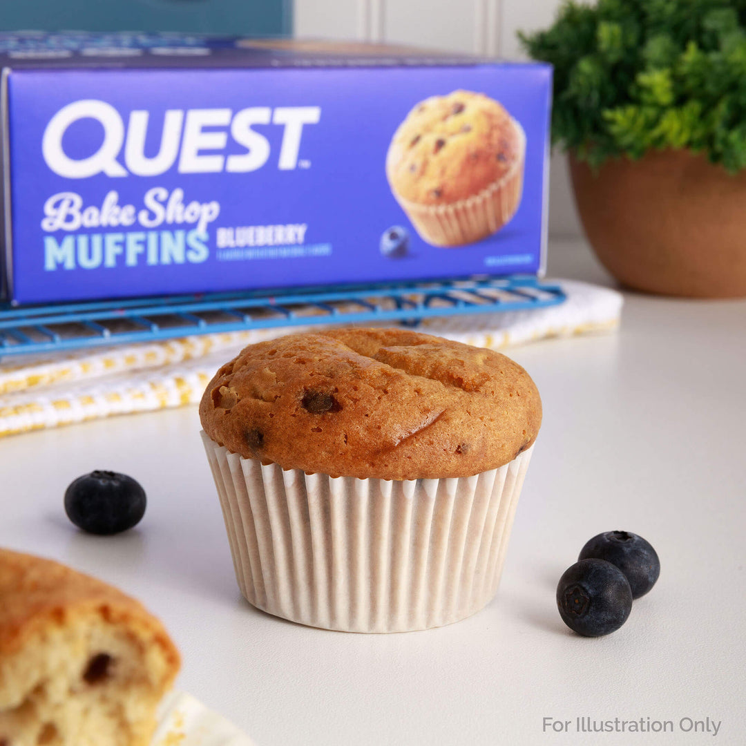 Bake Shop Blueberry Muffins with blueberries; A box of Bake Shop Blueberry Muffins at the background