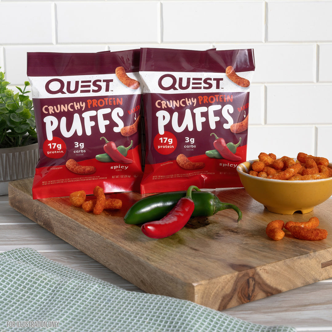 Spicy Crunchy Protein Puffs bags on the cutting board
